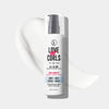 Bottle of Love Ur Curls hair care product on a white background